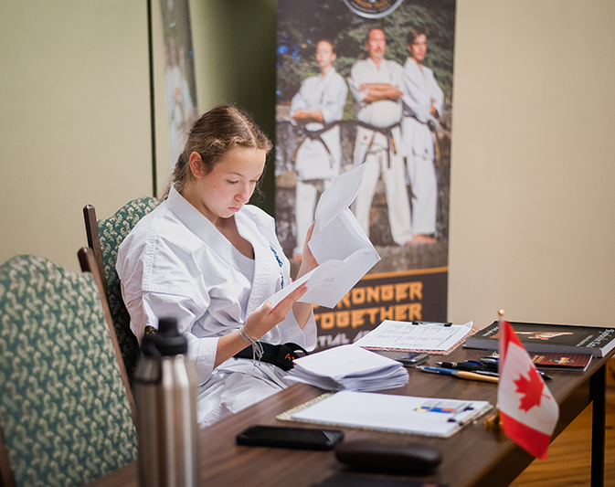 Young martial artist focused during the karate exam