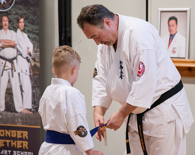Young martial artist during the karate exam