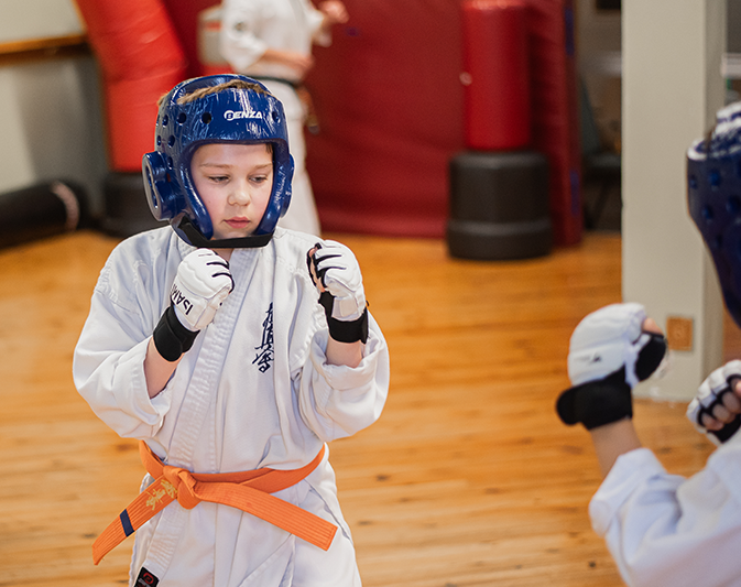 Karate student completing an exam technique