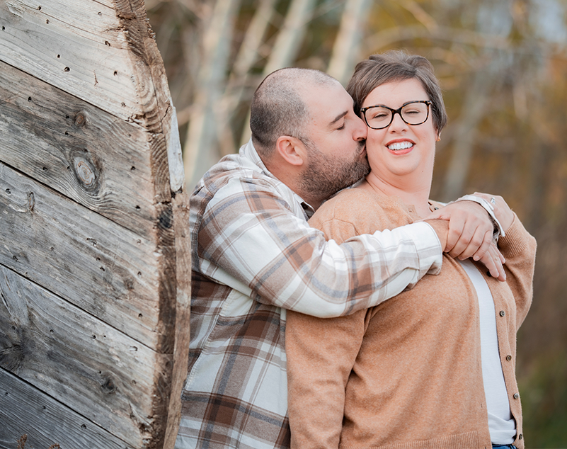 Couple embracing during their engagement session